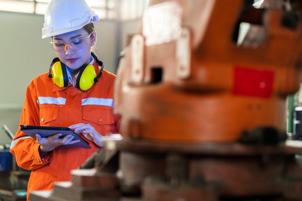 Engineer using a coordinate-measuring system to analyse a component