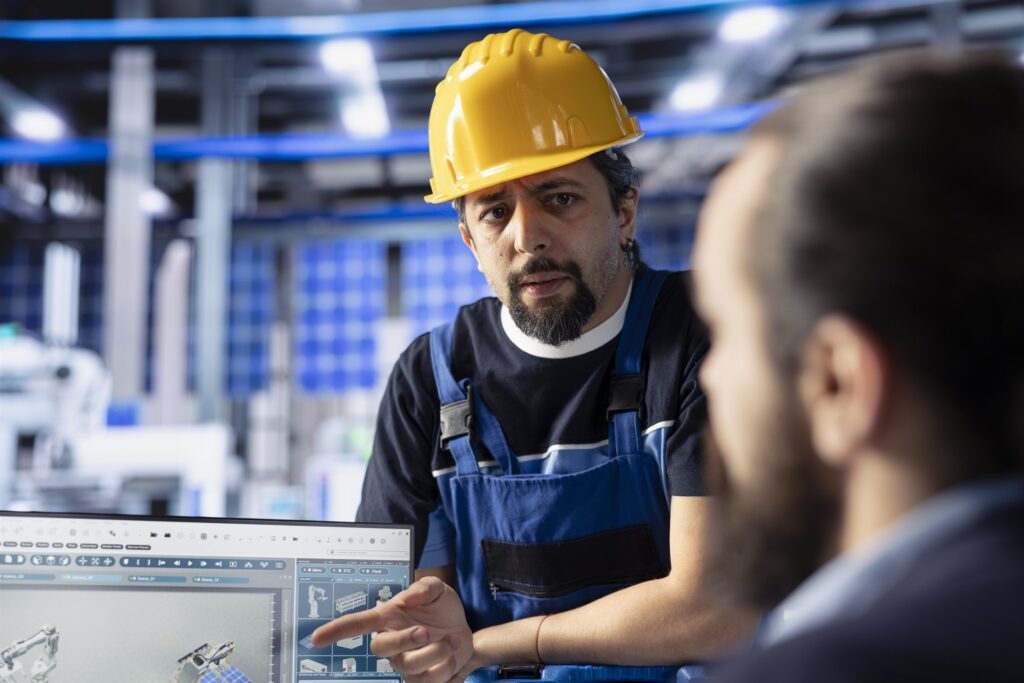 An engineering team reviewing energy system performance at a facility