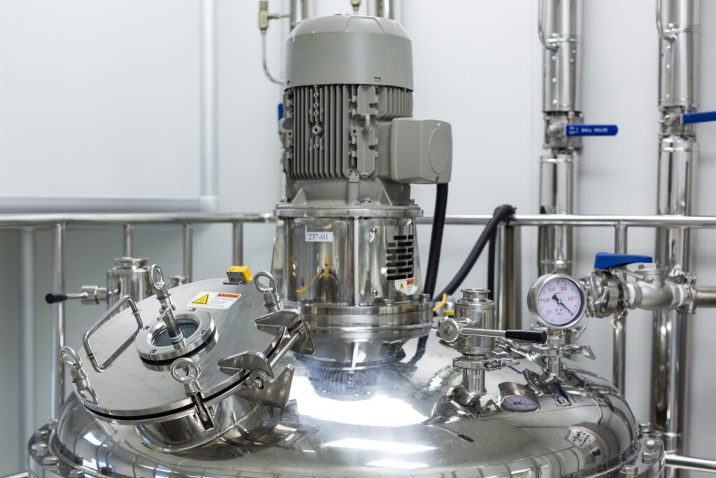 Stainless process vessel with a pressure gauge and instrumentation in a plant