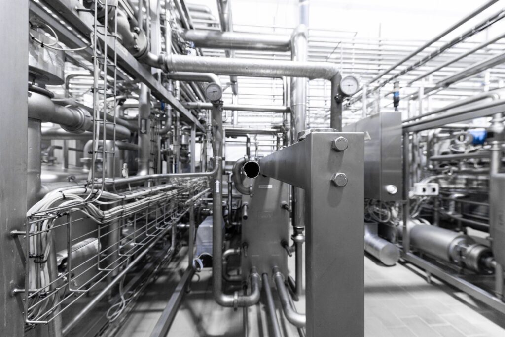 A complex maze of pipework and equipment in an industrial plant