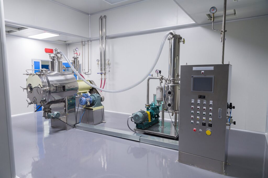 A clean, well-run process plant room with stainless equipment